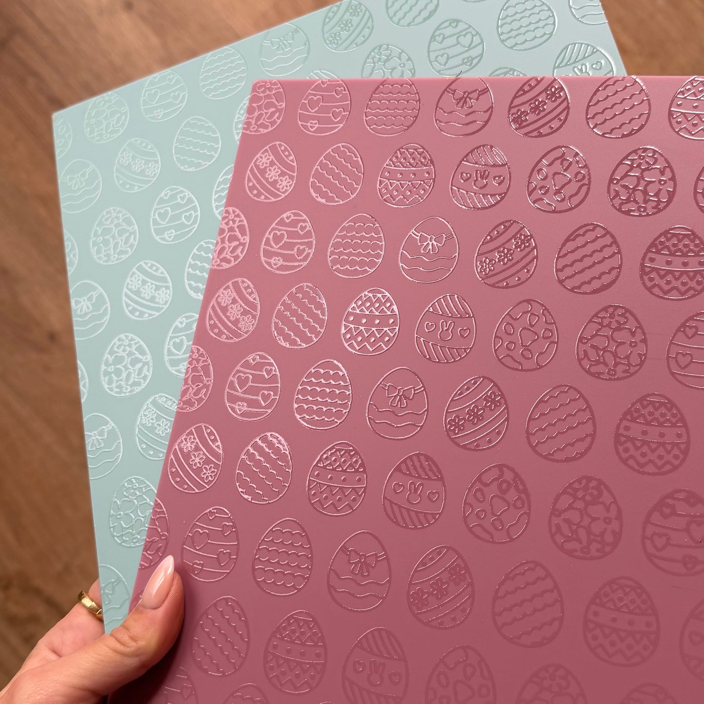 Embossed glossy easter eggs on matte acrylic