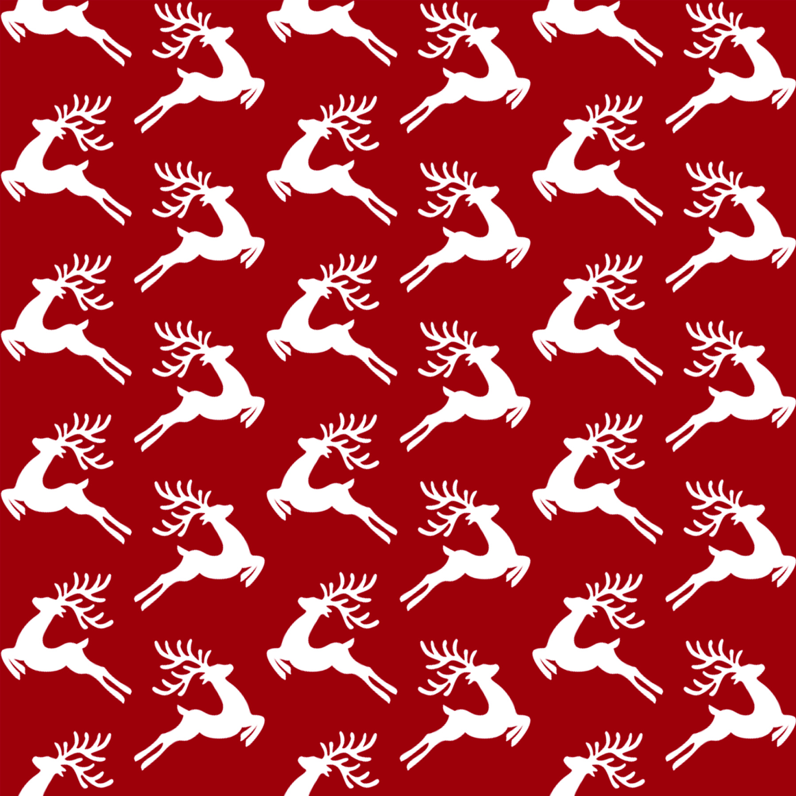 White reindeer pattern on a red background