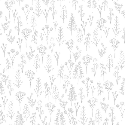 A printed sheet of acrylic featuring a botanical pattern with various plants and flowers in silver colour on a white background.