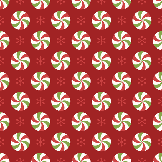 Pattern of red, green, and white peppermint candies on a red background