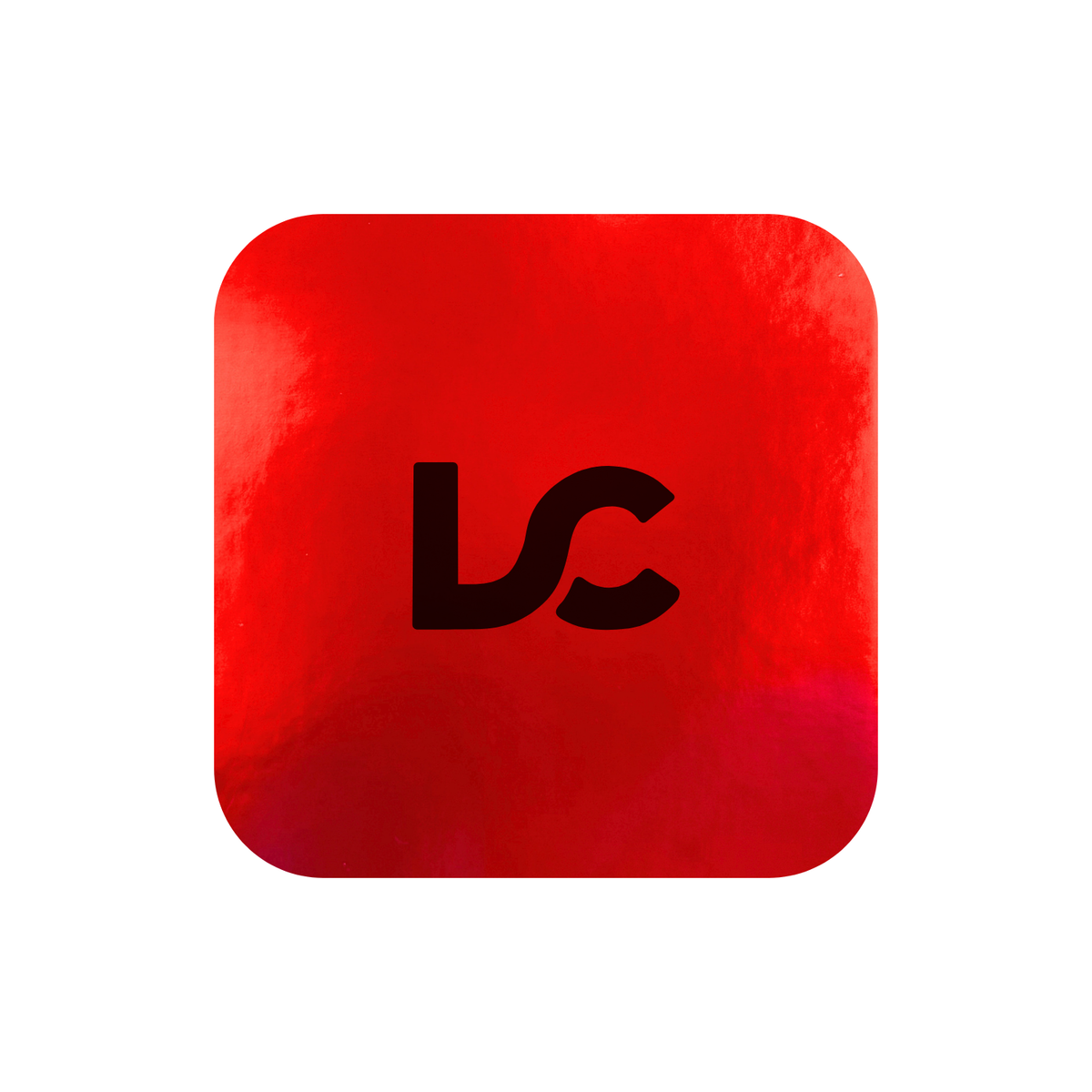 A metallic red square that engraves to black