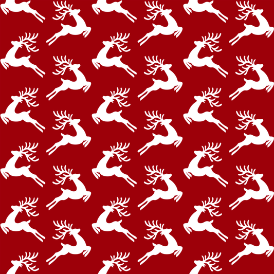 White reindeer pattern on a red background
