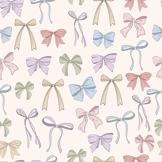 Pattern of colorful bows on a light background