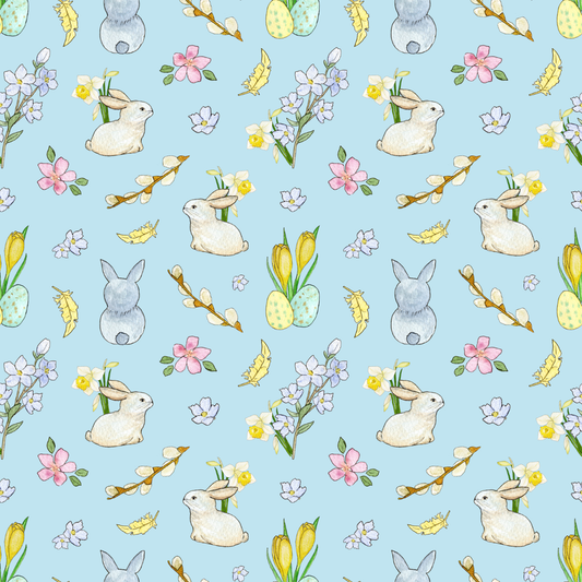 Pattern of Easter bunnies, eggs, and flowers on a blue background